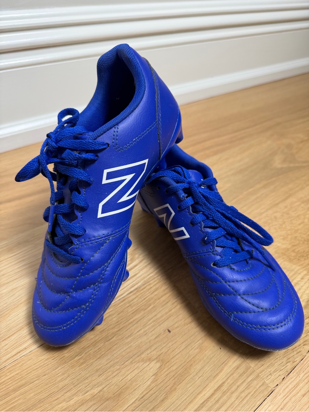 New Balance US Kids 2.5 Blue Soccer Cleats with White Logo